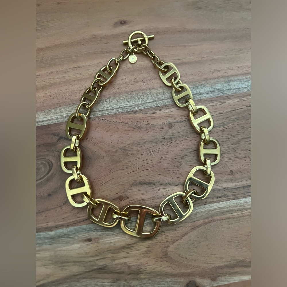 Michael Kors toggle choker. In yellow gold color. Like new.
